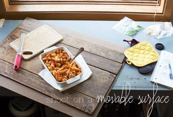 Food in a dish on a wooden surface.