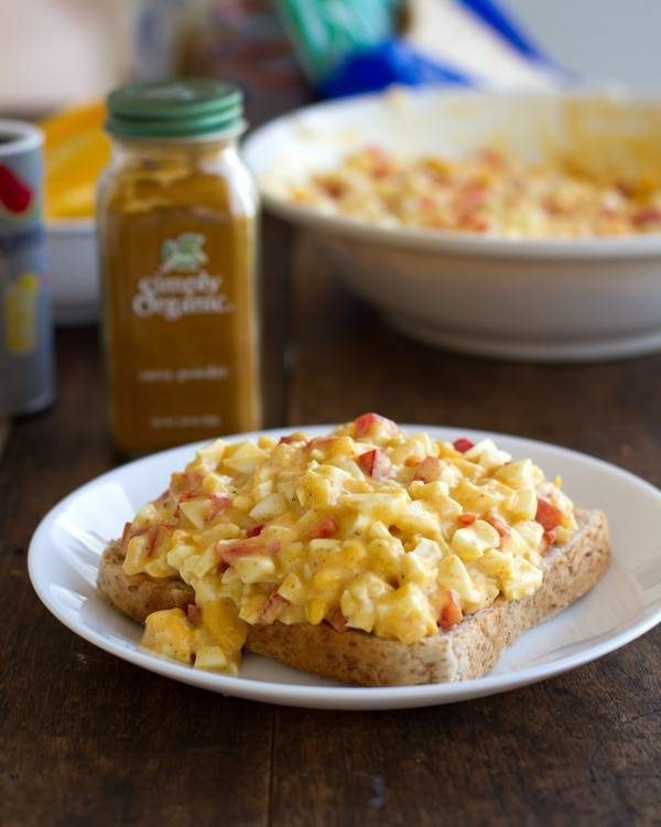 Curry egg salad on a piece of bread.
