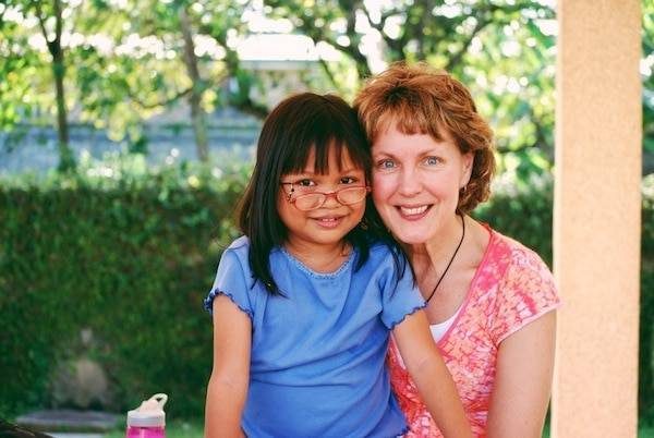 Woman with young children.