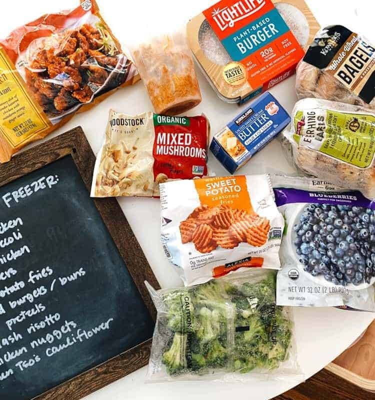 Bags of foods on a white table.